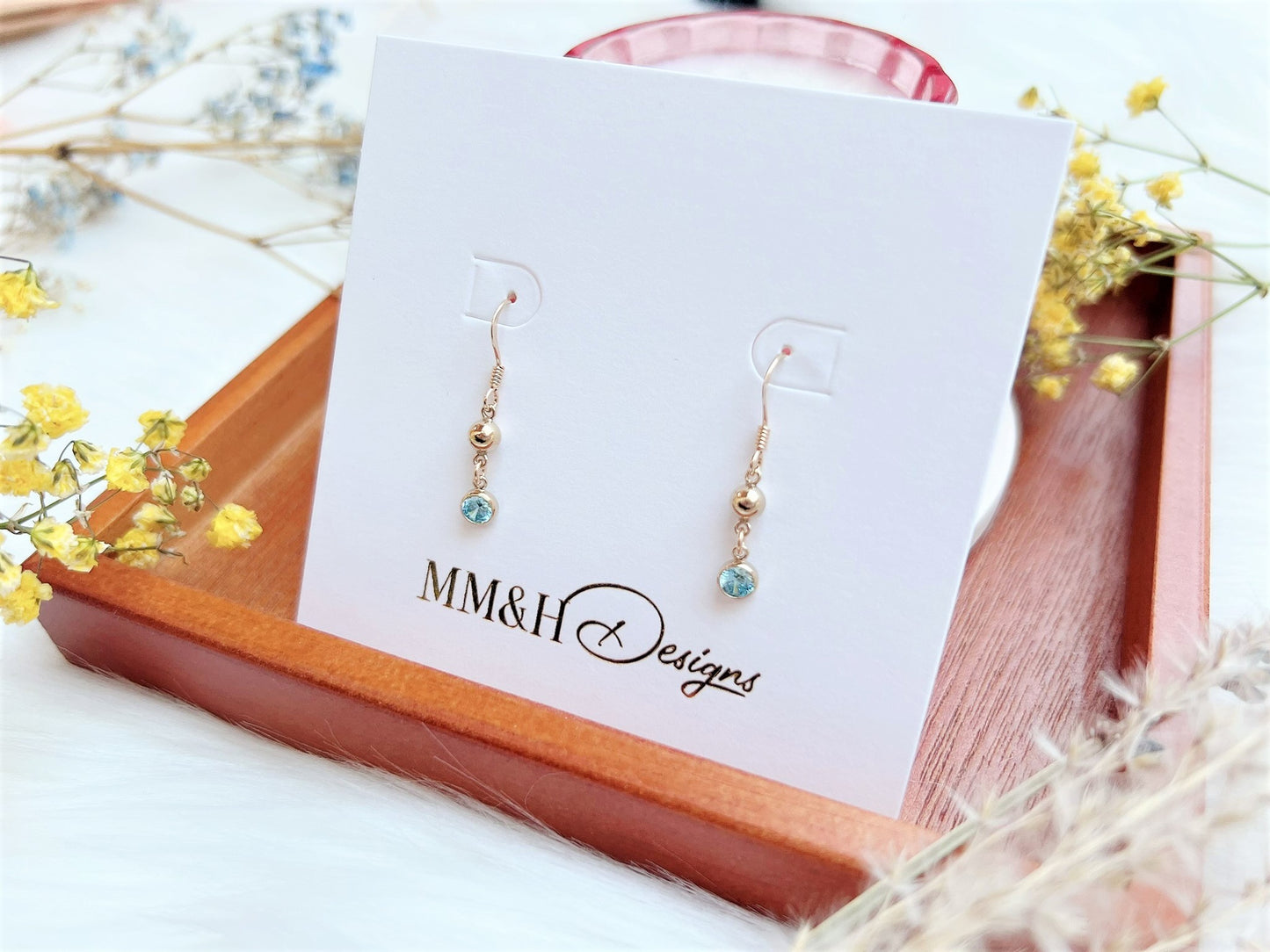 Gold Bead and Aquamarine Blue Cubic Zirconia Charm Earrings