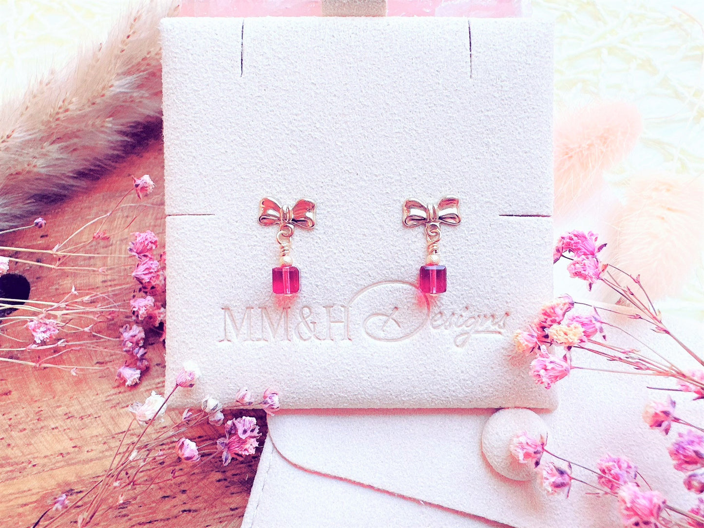 Bow Stud Earrings with Crystal Cube