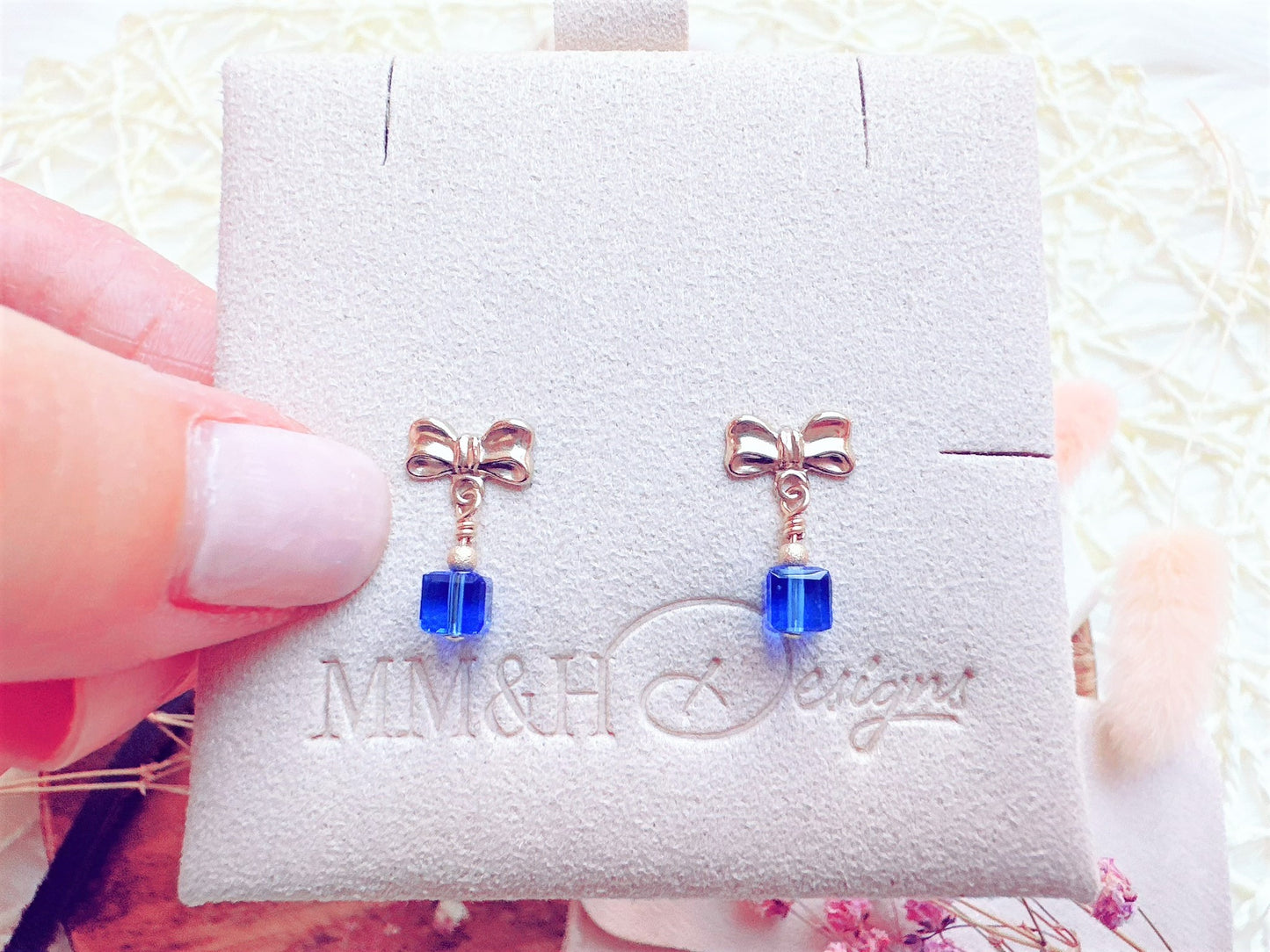 Bow Stud Earrings with Crystal Cube