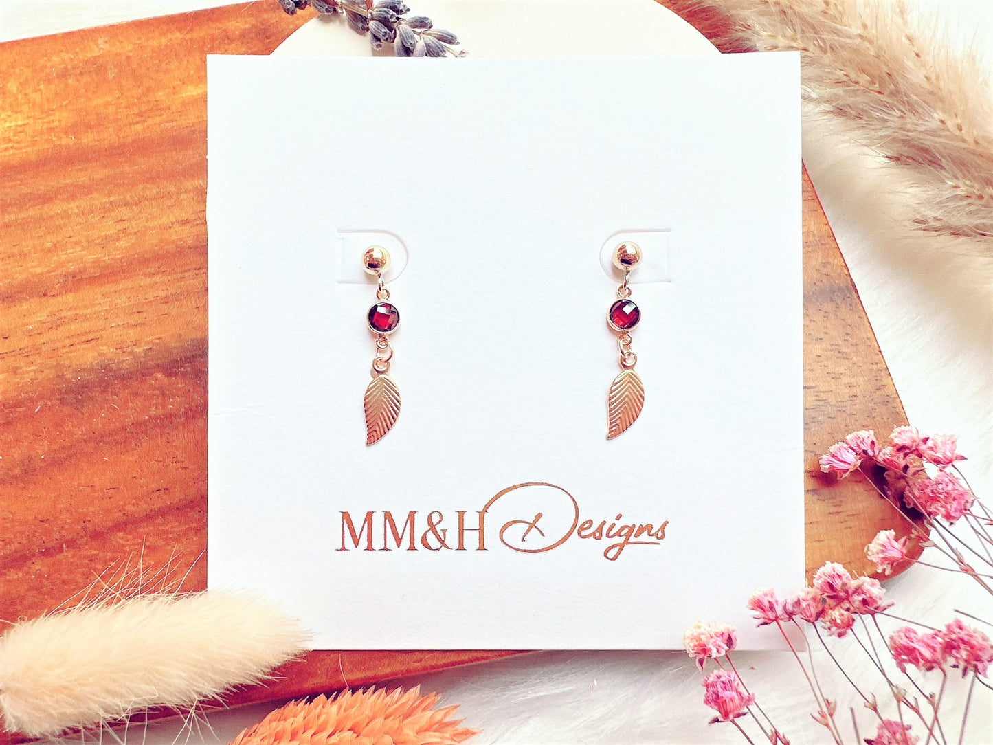 Stud Earrings With Cubic Zirconia and Leaf Charm